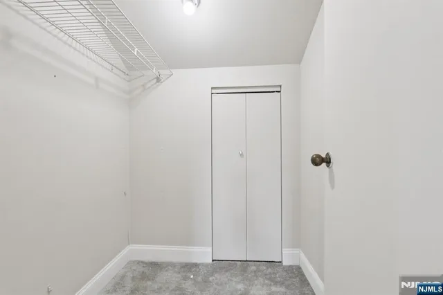 an aerial view of a house with yard swimming pool and outdoor seating