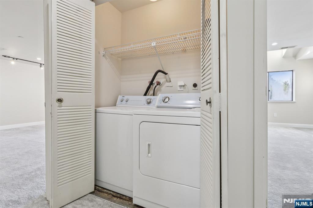 5 Millay Court Teaneck, NJ 07666 - Photo 30 of 36 a utility room with dryer and washer
