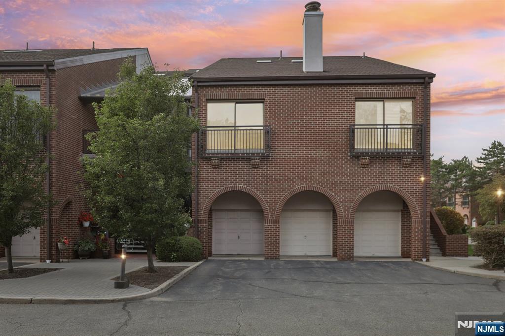 5 Millay Court Teaneck, NJ 07666 - Photo 34 of 36 a front view of a house with parking
