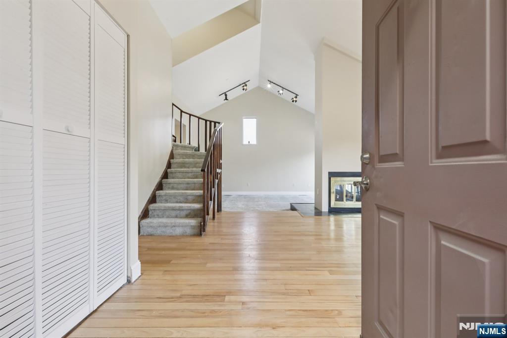 5 Millay Court Teaneck, NJ 07666 - Photo 6 of 36 a view of entryway and hall with wooden floor