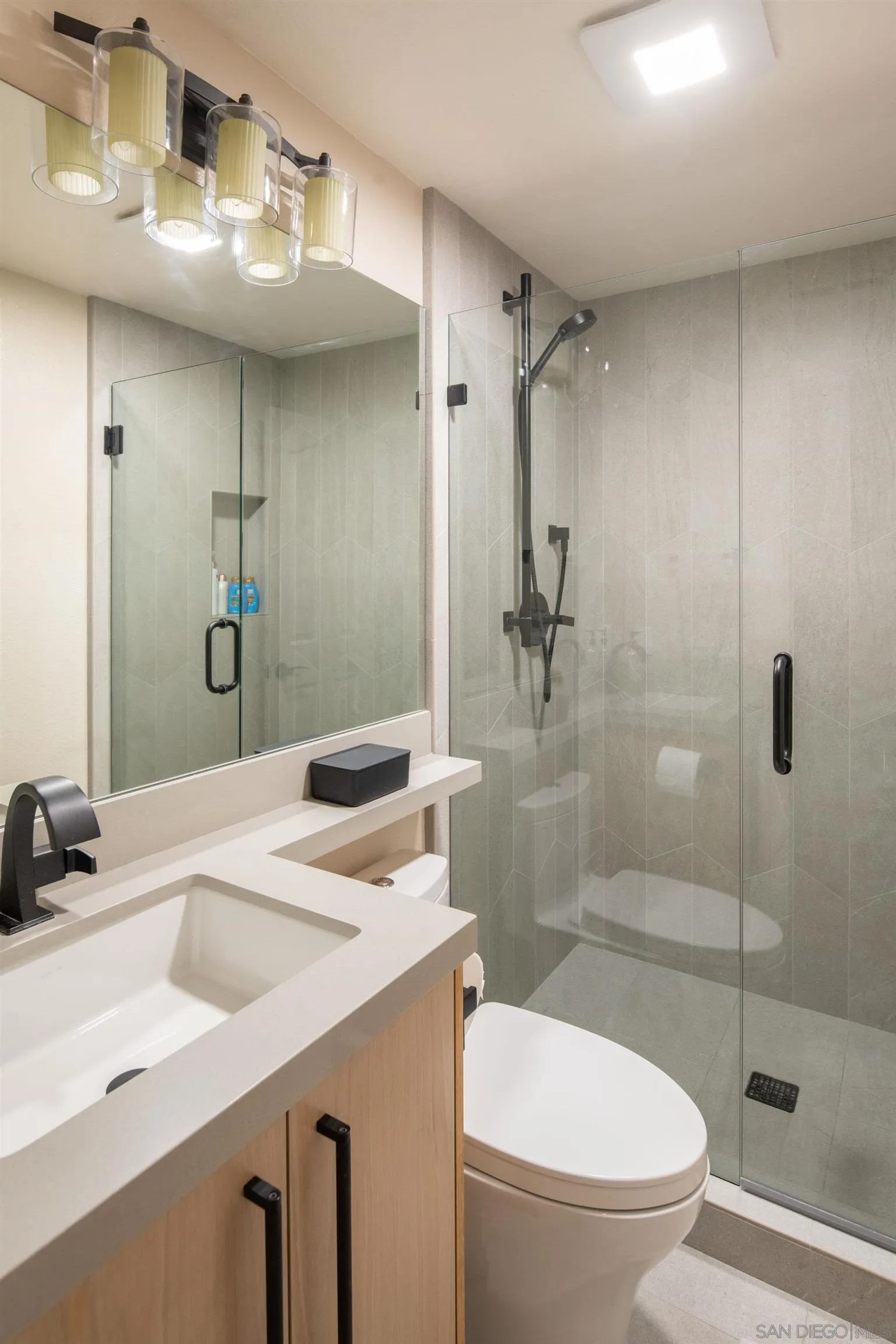 3476 Corte Sonrisa Carlsbad, CA 92009 - Photo 29 of 45 a bathroom with a sink toilet and shower