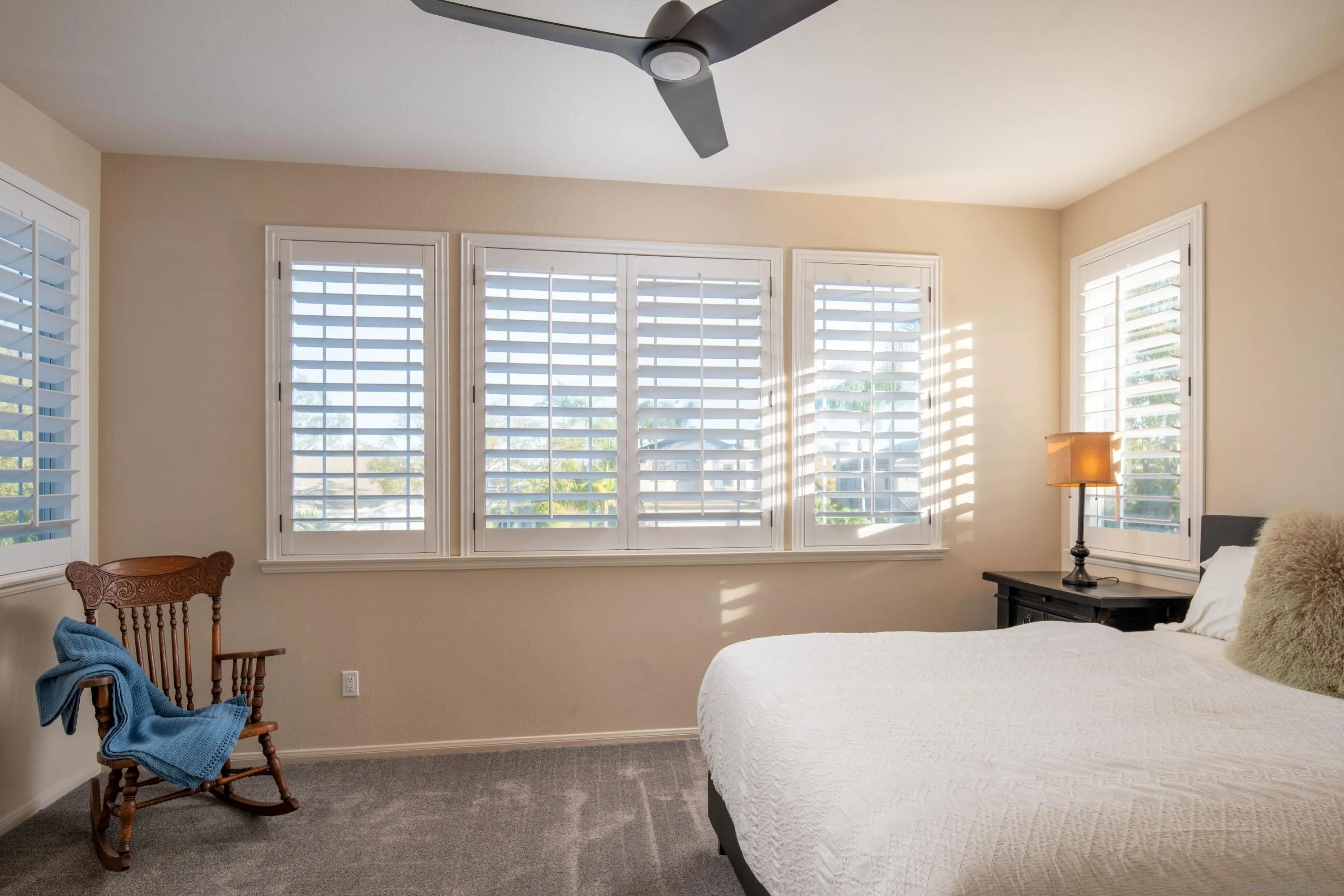3476 Corte Sonrisa Carlsbad, CA 92009 - Photo 32 of 45 a bedroom with a bed and a window