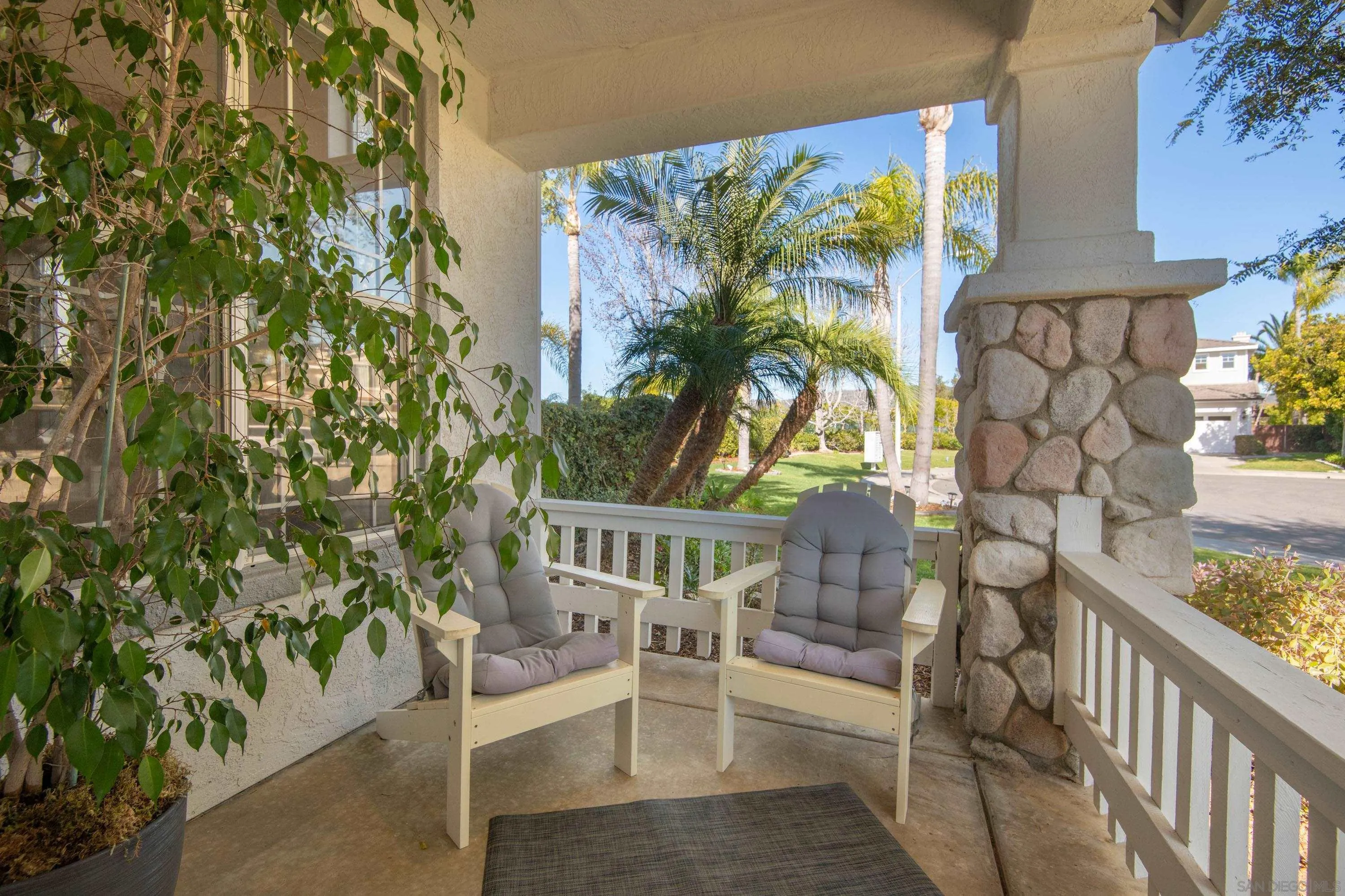 3476 Corte Sonrisa Carlsbad, CA 92009 - Photo 6 of 45 a view of porch with a bench