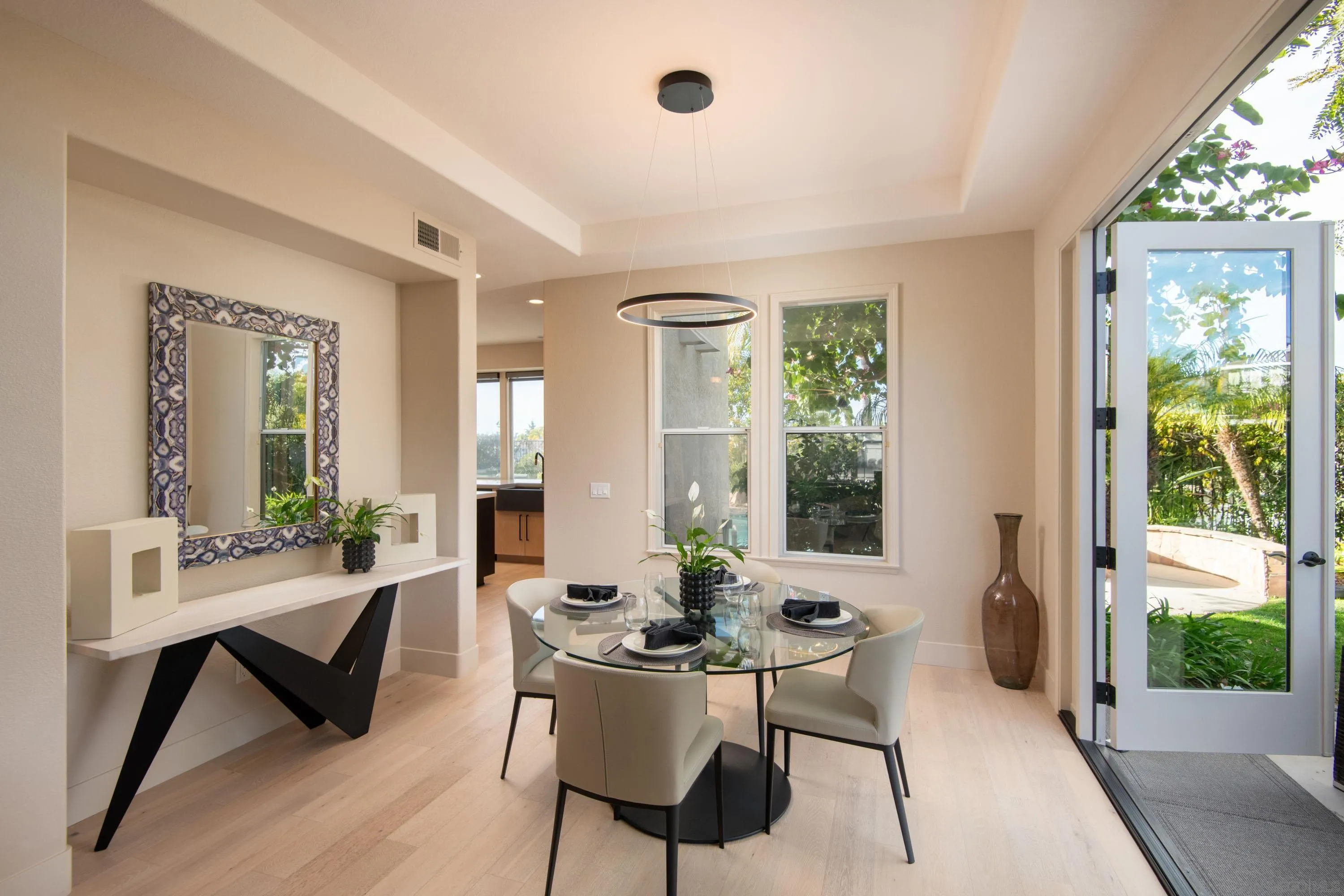 3476 Corte Sonrisa Carlsbad, CA 92009 - Photo 10 of 45 a view of a dining room with furniture and window