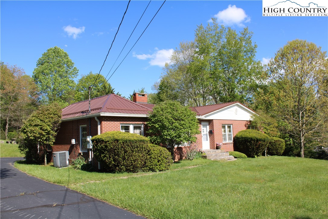 268 Farthing Street Boone, NC 28607 - Photo 1 of 30 a front view of a house with a yard