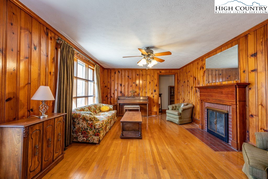 268 Farthing Street Boone, NC 28607 - Photo 11 of 30 a bedroom with furniture and a fireplace