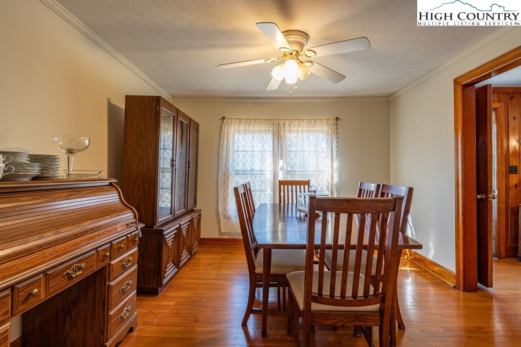 268 Farthing Street Boone, NC 28607 - Photo 14 of 30 a view of a dining room with furniture window and wooden floor