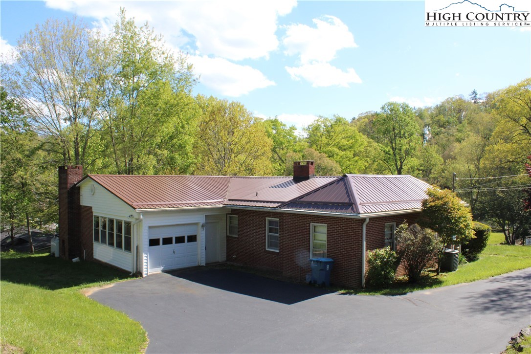 268 Farthing Street Boone, NC 28607 - Photo 2 of 30 a aerial view of a house next to a yard