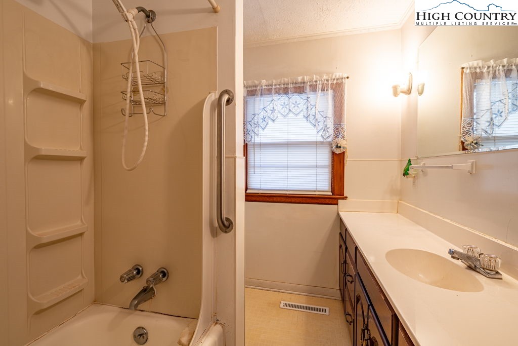 268 Farthing Street Boone, NC 28607 - Photo 23 of 30 a bathroom with a sink and a shower