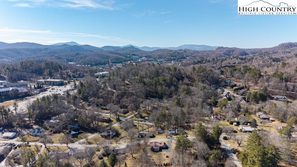 268 Farthing Street Boone, NC 28607 - Photo 29 of 30 a view of a lush green hillside and a houses