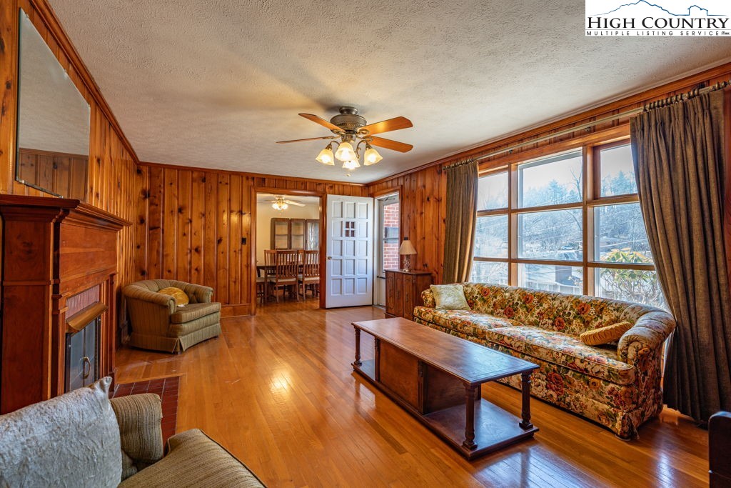 268 Farthing Street Boone, NC 28607 - Photo 9 of 30 a living room with furniture ceiling fan and a window