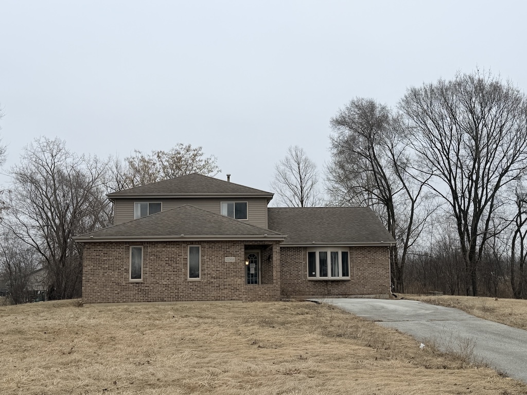 22503 State Street Steger, IL 60475 - Photo 1 of 20 a front view of a house with a yard