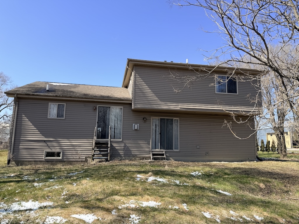 22503 State Street Steger, IL 60475 - Photo 17 of 20 a view of a house with car parked on the road