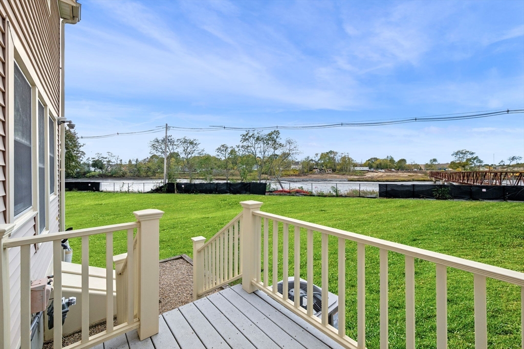 33 Water Street, Unit 7 Danvers, MA 01923 - Photo 17 of 35 a view of deck with a big yard