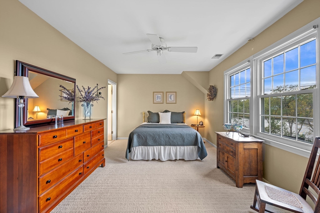 33 Water Street, Unit 7 Danvers, MA 01923 - Photo 20 of 35 a bedroom with a large bed and a large window