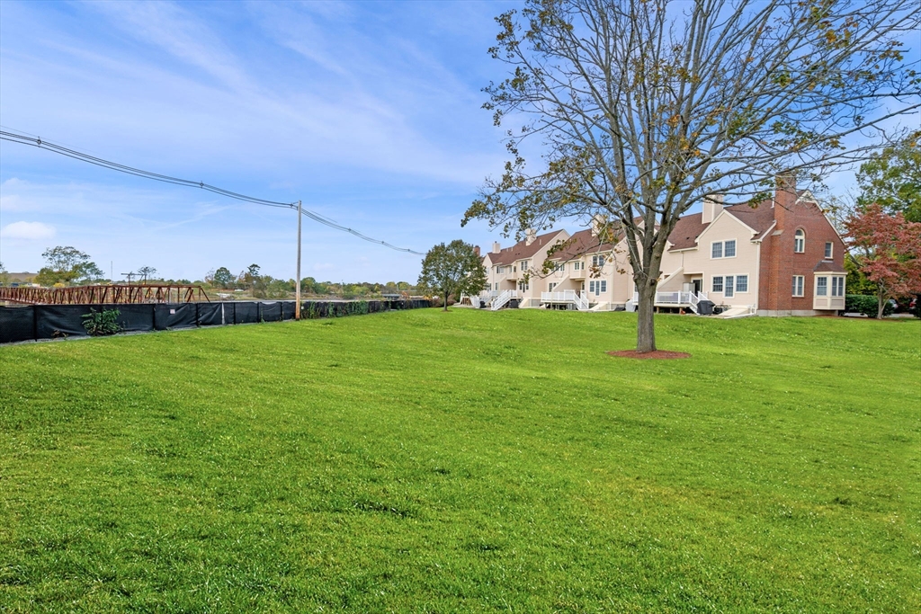 33 Water Street, Unit 7 Danvers, MA 01923 - Photo 25 of 35 a view of a trees with a big yard