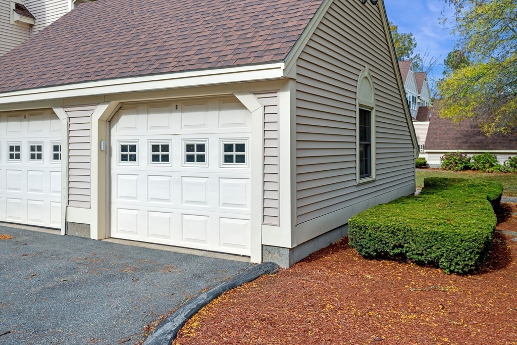 33 Water Street, Unit 7 Danvers, MA 01923 - Photo 3 of 35 a front view of a house with a yard