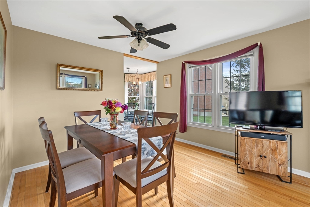 33 Water Street, Unit 7 Danvers, MA 01923 - Photo 10 of 35 a view of a dining room with furniture window and wooden floor