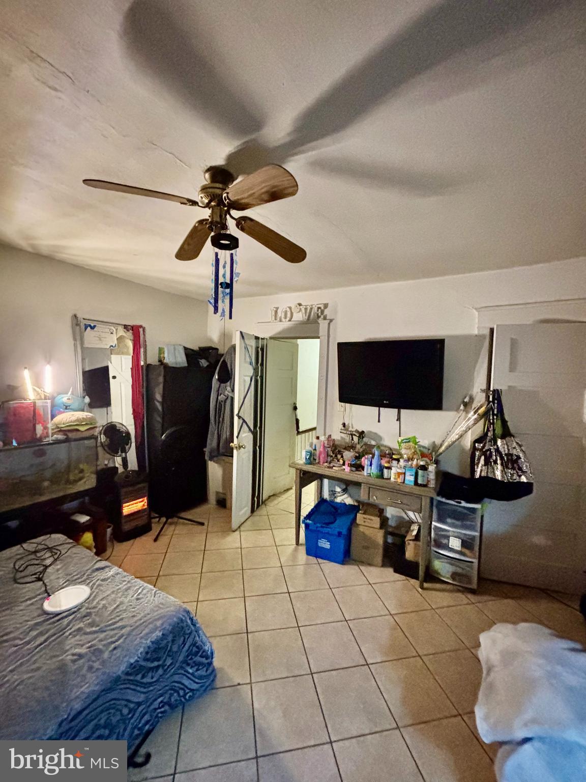 2535 Lindsay Street Chester, PA 19013 - Photo 13 of 22 a living room with furniture and a flat screen tv