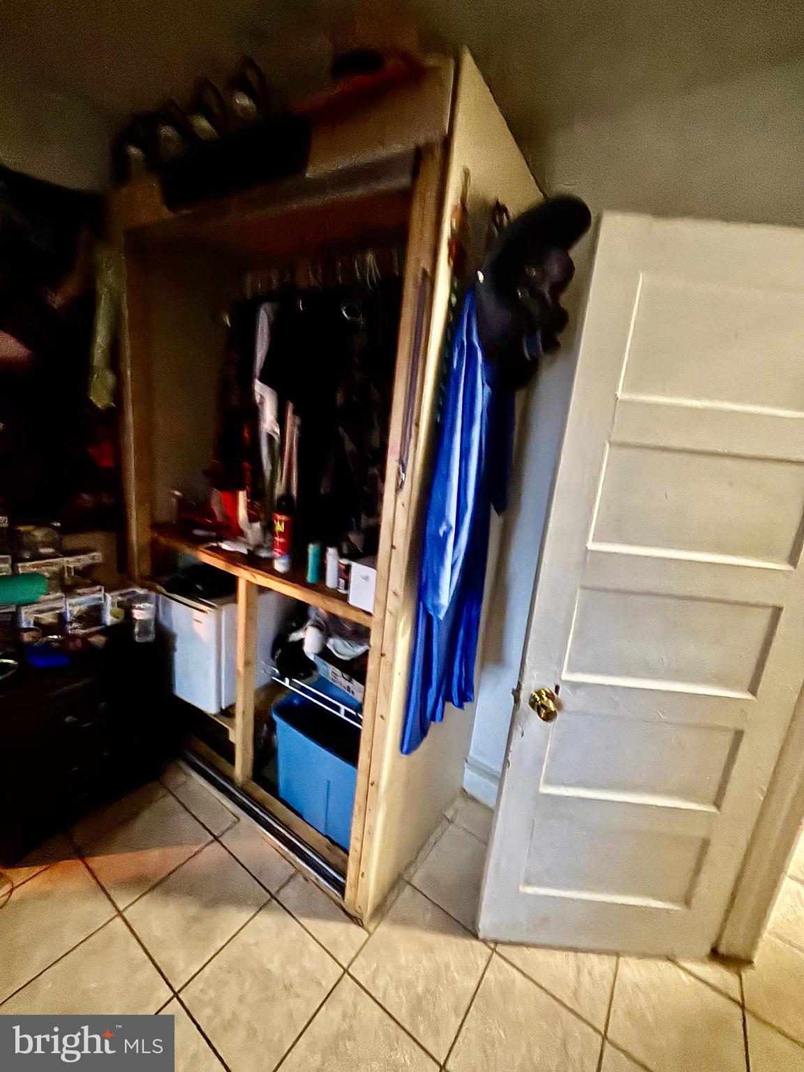 2535 Lindsay Street Chester, PA 19013 - Photo 19 of 22 a view of walk in closet with clothes and shoes