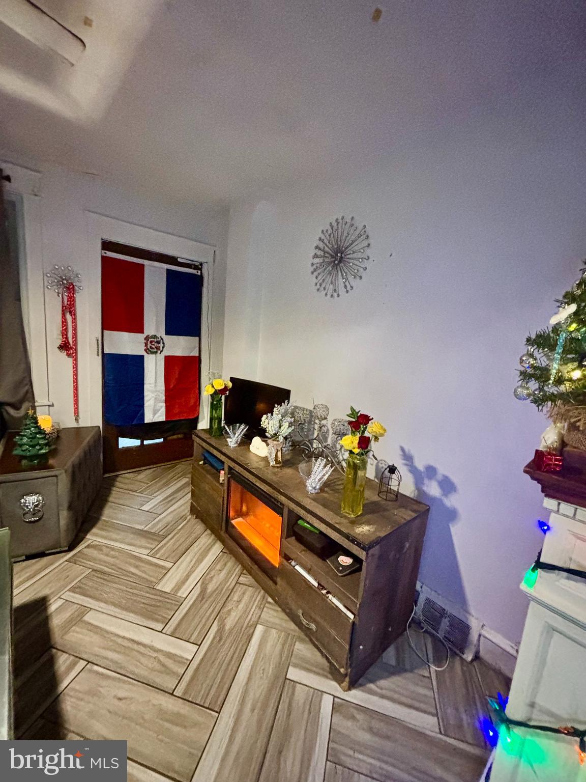 2535 Lindsay Street Chester, PA 19013 - Photo 6 of 22 a bed room with a bed and a television