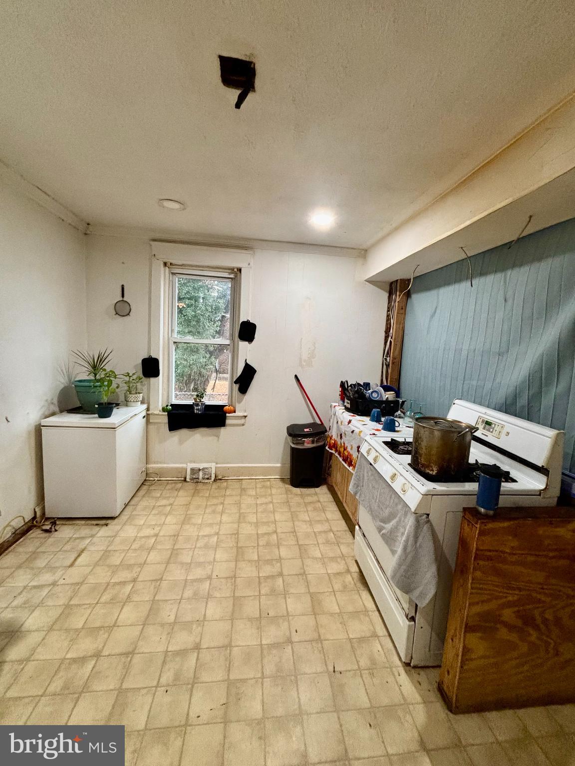 2535 Lindsay Street Chester, PA 19013 - Photo 9 of 22 a large white room with furniture