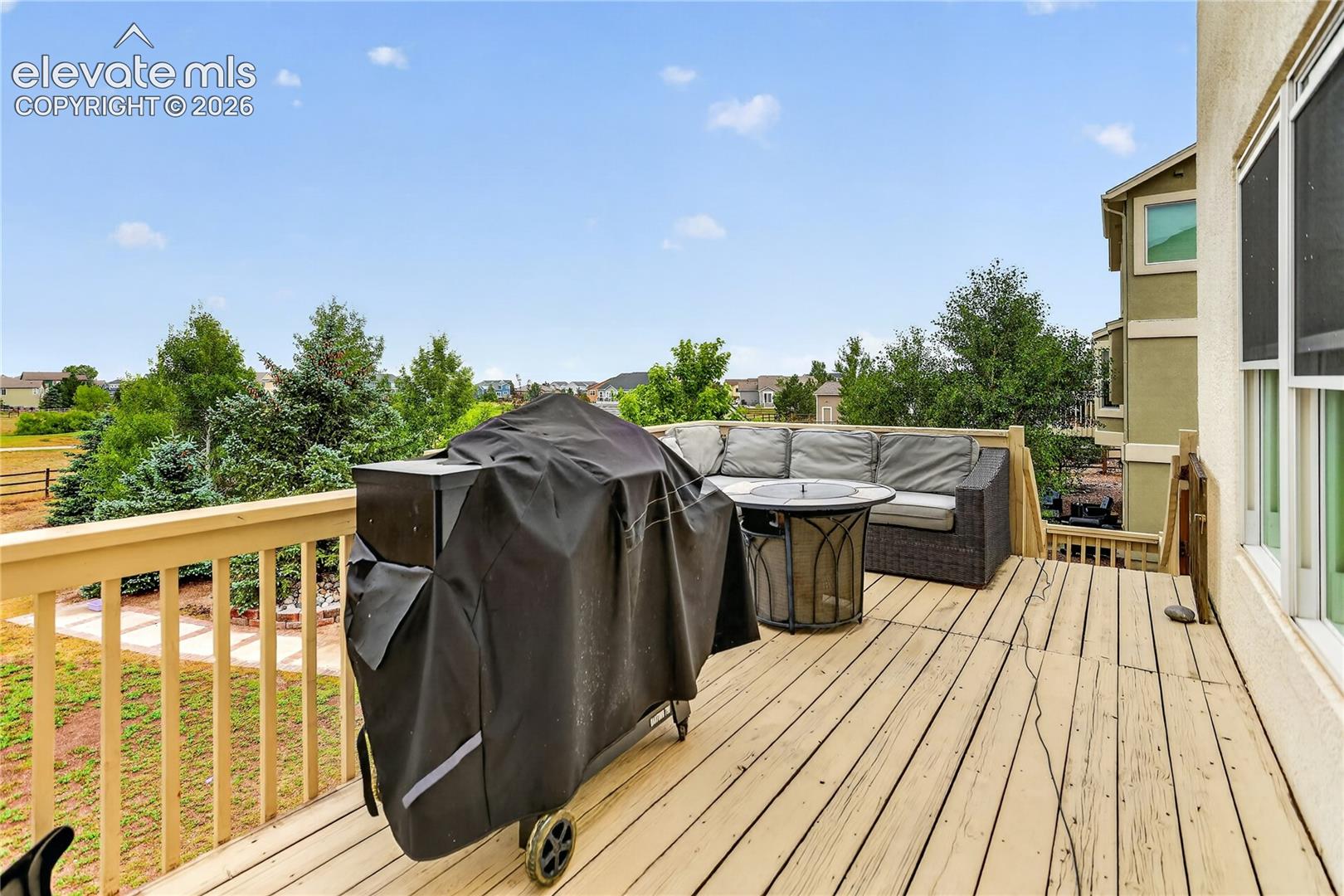 11662 Rio Secco Road Peyton, CO 80831 - Photo 25 of 29 Deck off of wet bar area