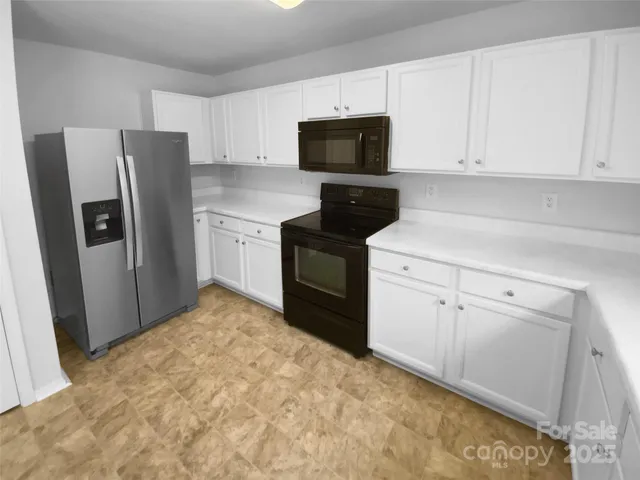 a view of livingroom and a fireplace