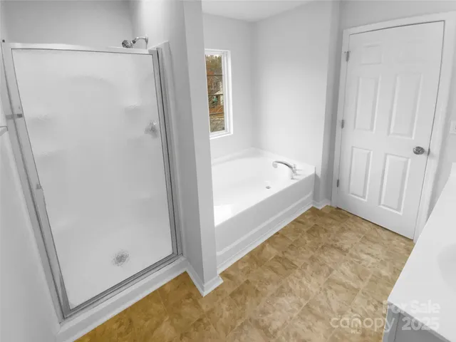 a bathroom with a sink toilet and vanity