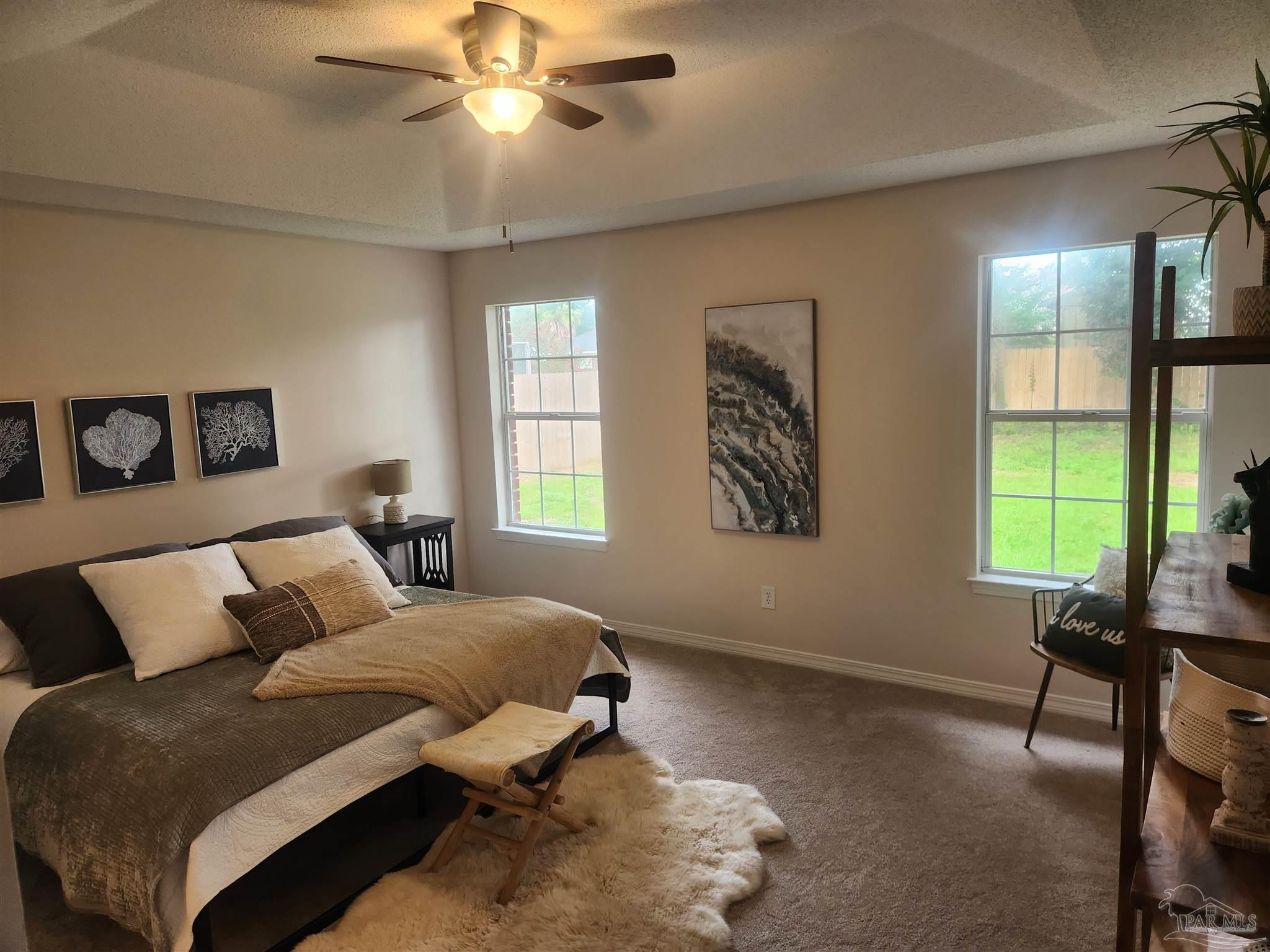 709 Jester Court Pensacola, FL 32506 - Photo 3 of 10 a bedroom with a bed and a window