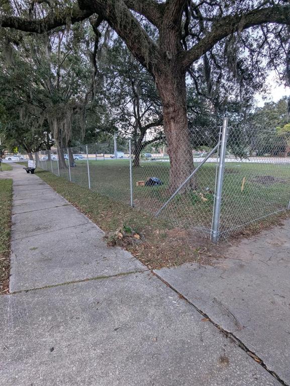4900 Baymeadows Road Jacksonville, FL 32257 - Photo 6 of 12 a backyard of a house with lots of green space