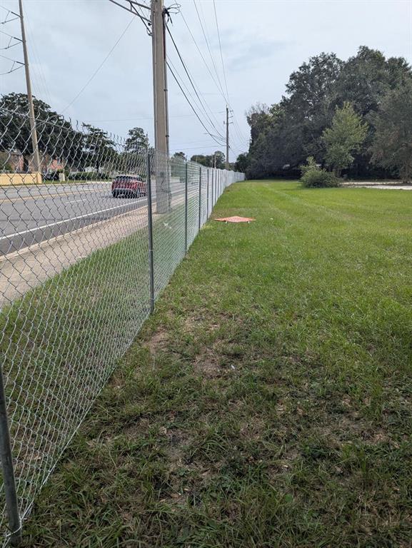 4900 Baymeadows Road Jacksonville, FL 32257 - Photo 7 of 12 a view of a yard with a fence