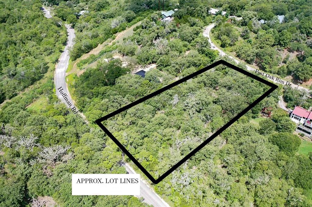 Tbd Post Oak Rim Drive Bastrop, TX 78602 - Photo 3 of 15 a view of a green field with lots of bushes