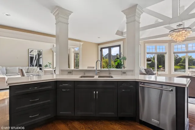 a kitchen with a sink and cabinets