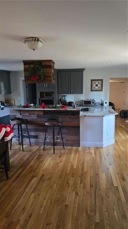 1967 Parker Road Southeast Conyers, GA 30094 - Photo 2 of 10 a living room with furniture and a wooden floor