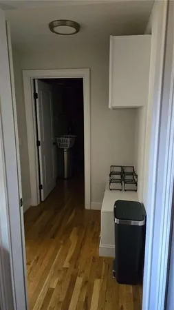 a kitchen with a stove and a refrigerator