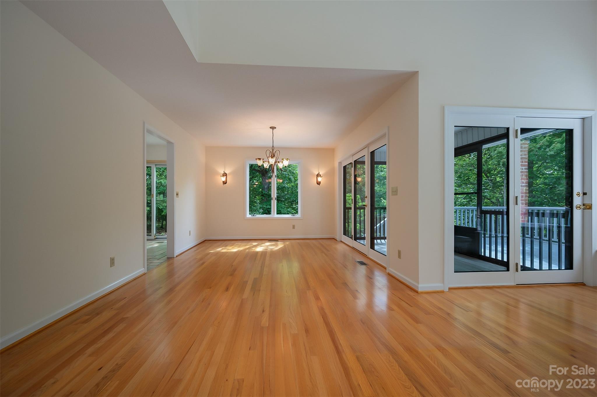 2236 Peniel Road Columbus, NC 28722 - Photo 15 of 48 wooden floor in an empty room with a window