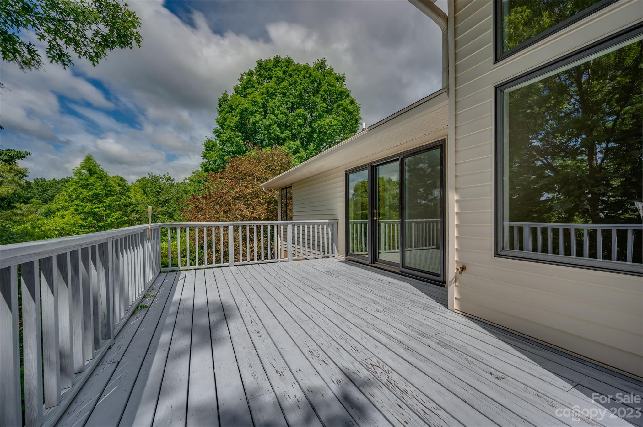 2236 Peniel Road Columbus, NC 28722 - Photo 20 of 48 a view of backyard with a deck