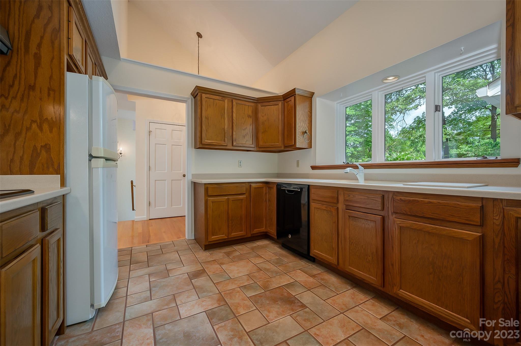 2236 Peniel Road Columbus, NC 28722 - Photo 26 of 48 a kitchen with a sink stove and refrigerator