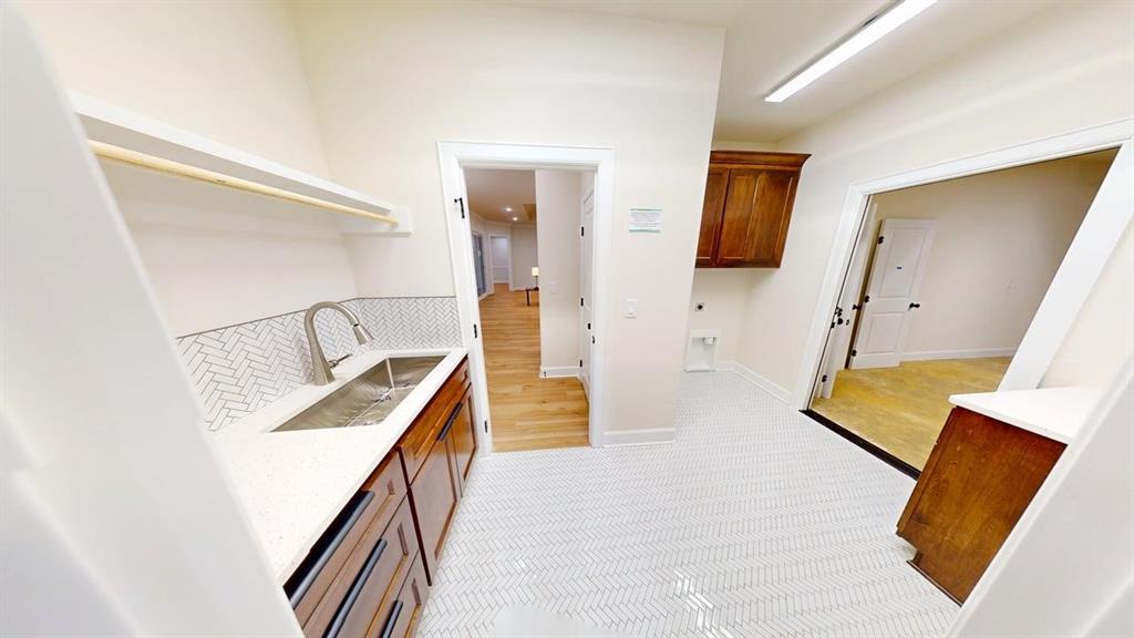 2509 Windmill Lane Longview, TX 75601 - Photo 11 of 35 a bedroom with a bed and a walk in closet