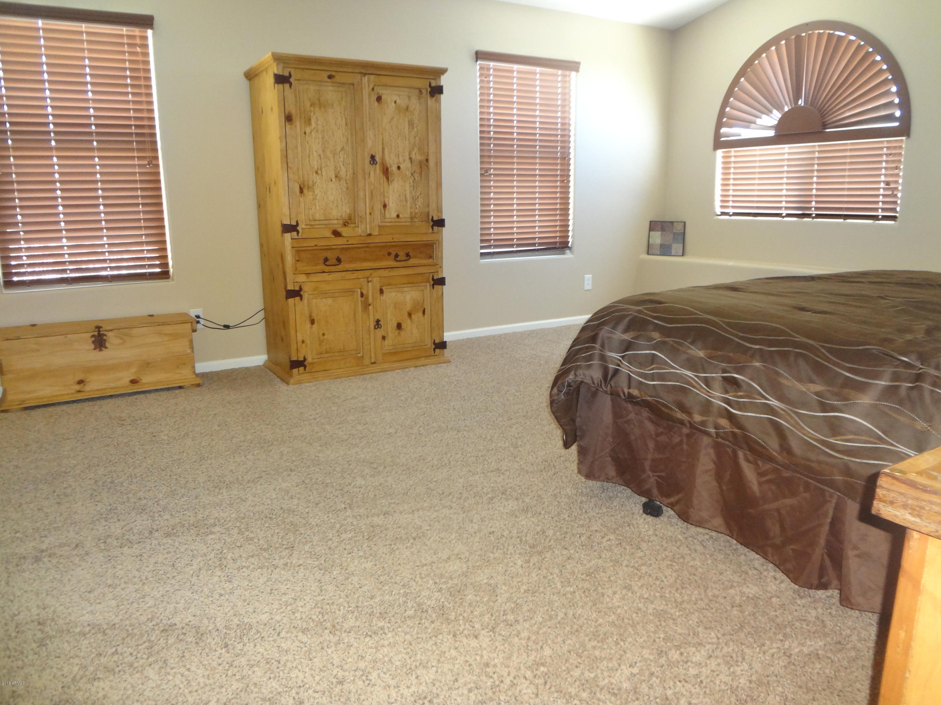 2222 West Roy Rogers Road Phoenix, AZ 85085 - Photo 20 of 37 master bedroom 2nd