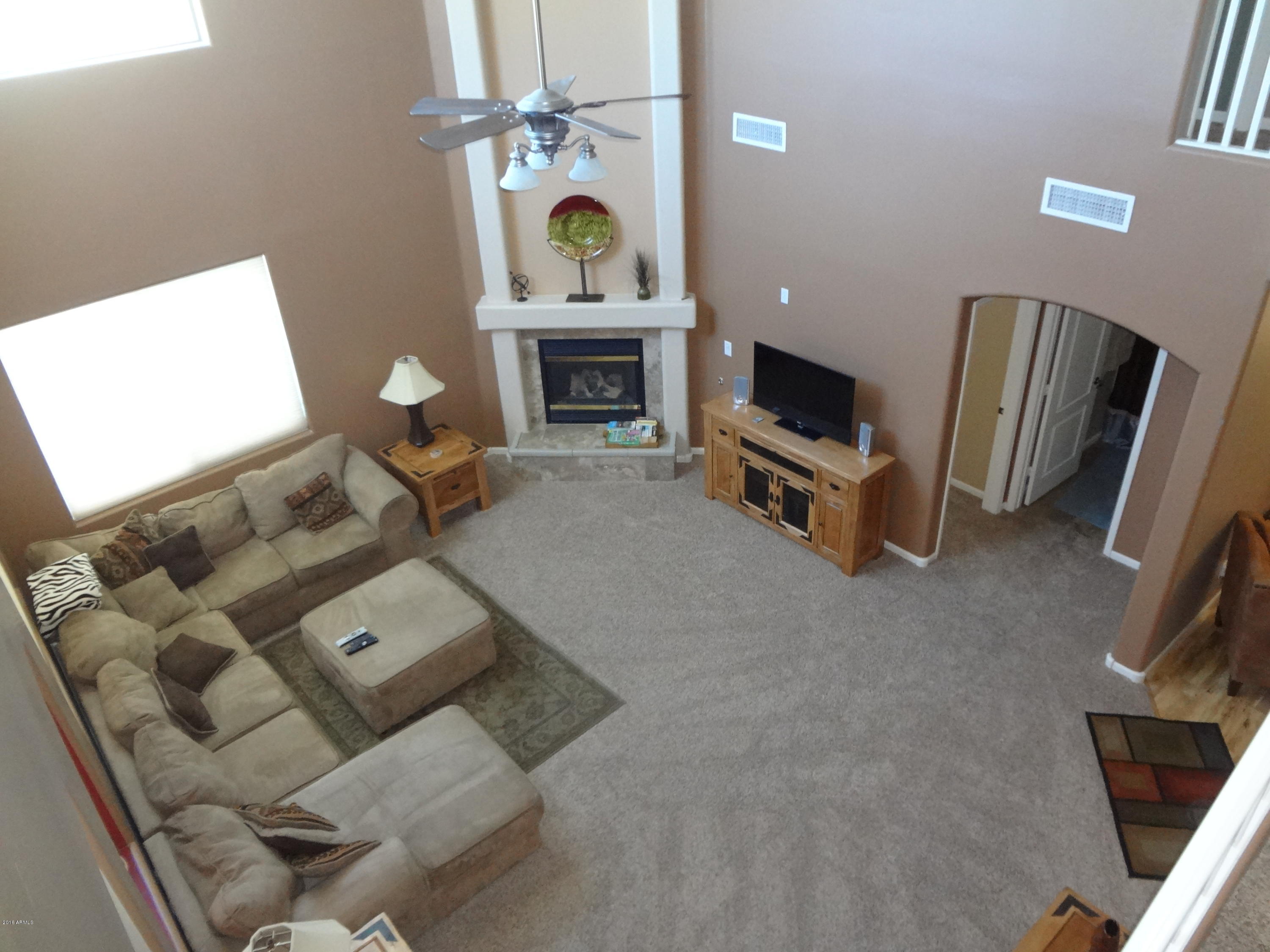2222 West Roy Rogers Road Phoenix, AZ 85085 - Photo 26 of 37 view from upstairs looking at family ro