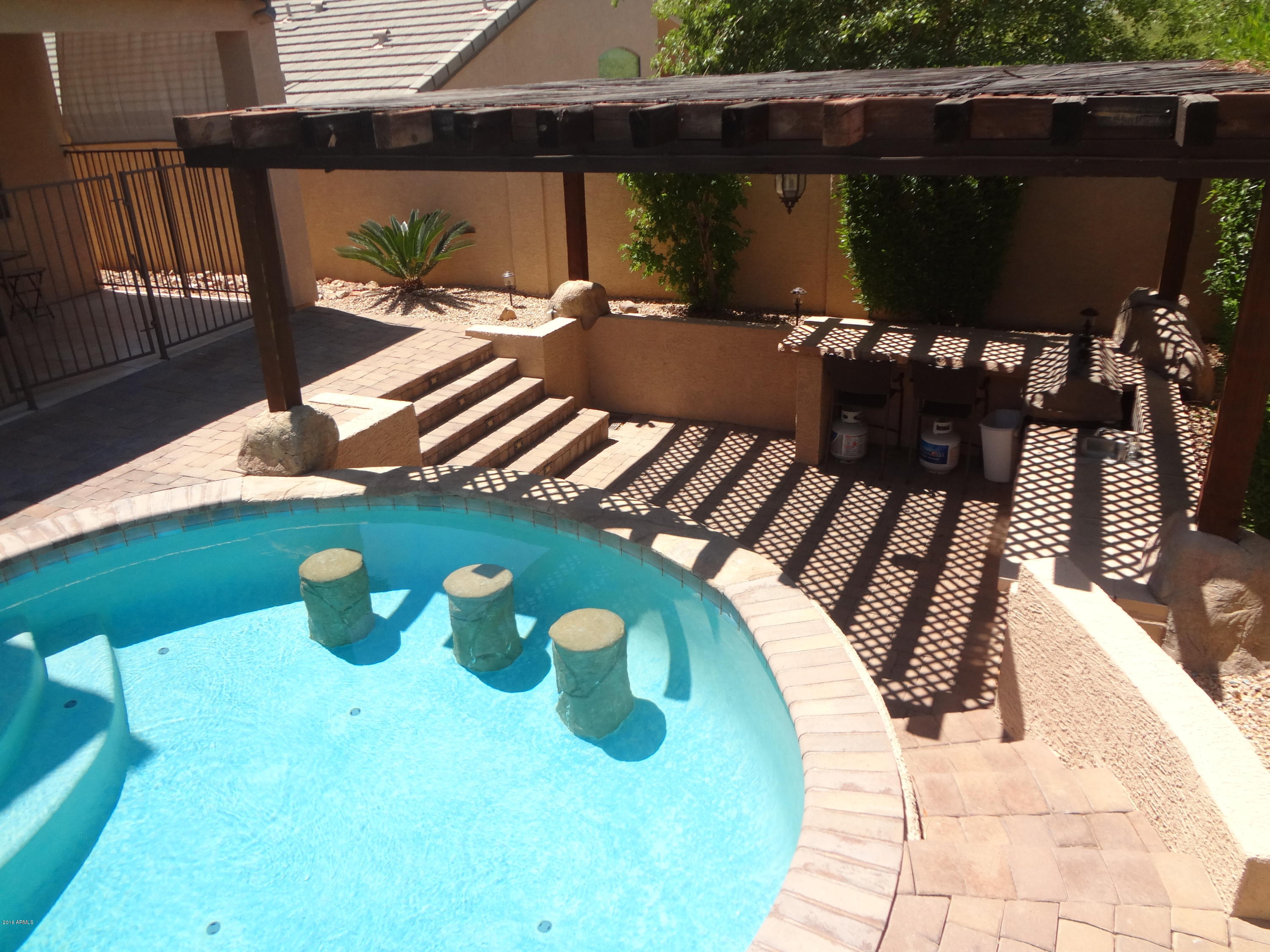 2222 West Roy Rogers Road Phoenix, AZ 85085 - Photo 30 of 37 pergola with BBQ- outdoor kitchen area