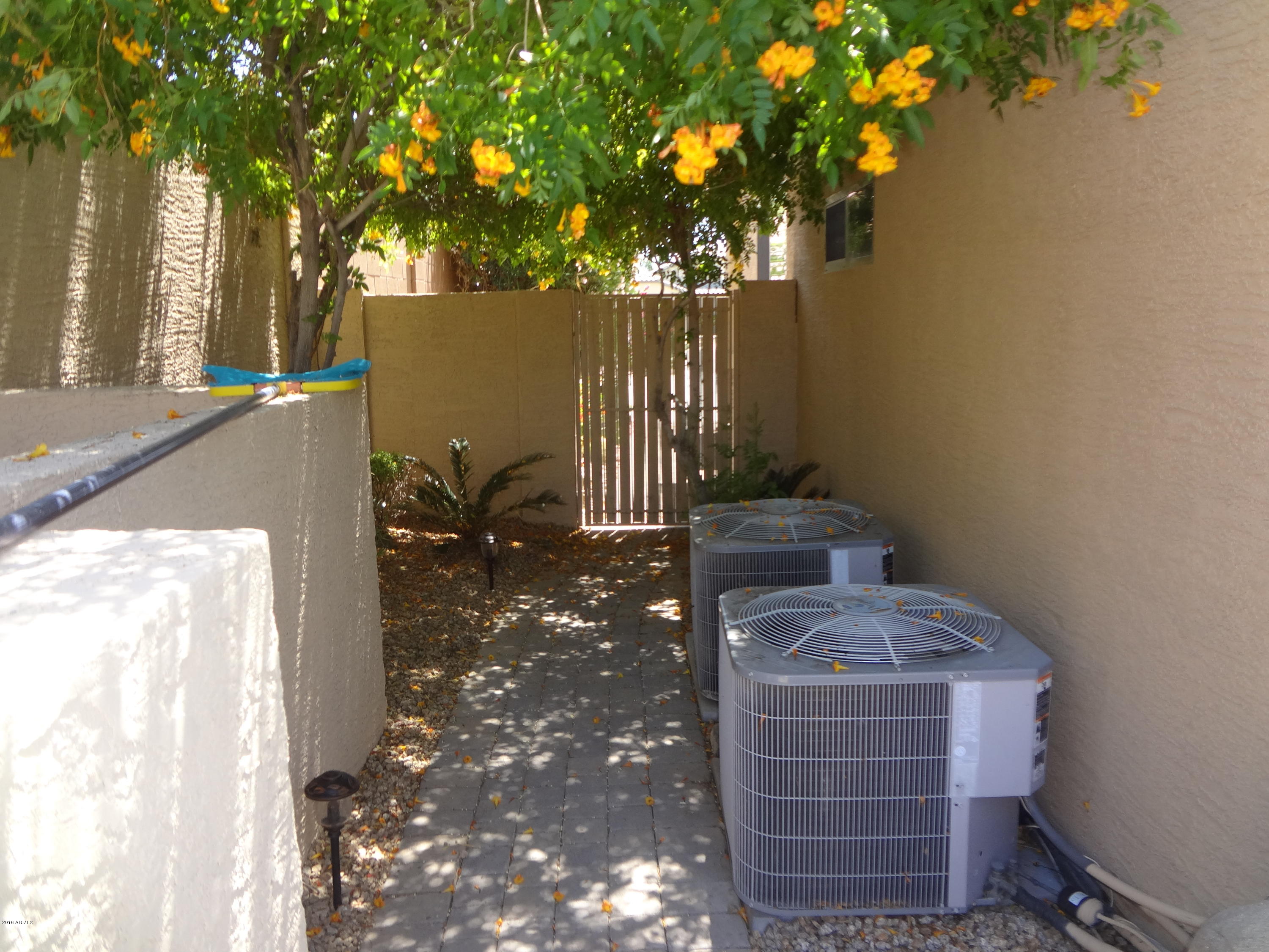 2222 West Roy Rogers Road Phoenix, AZ 85085 - Photo 31 of 37 side yard entrance