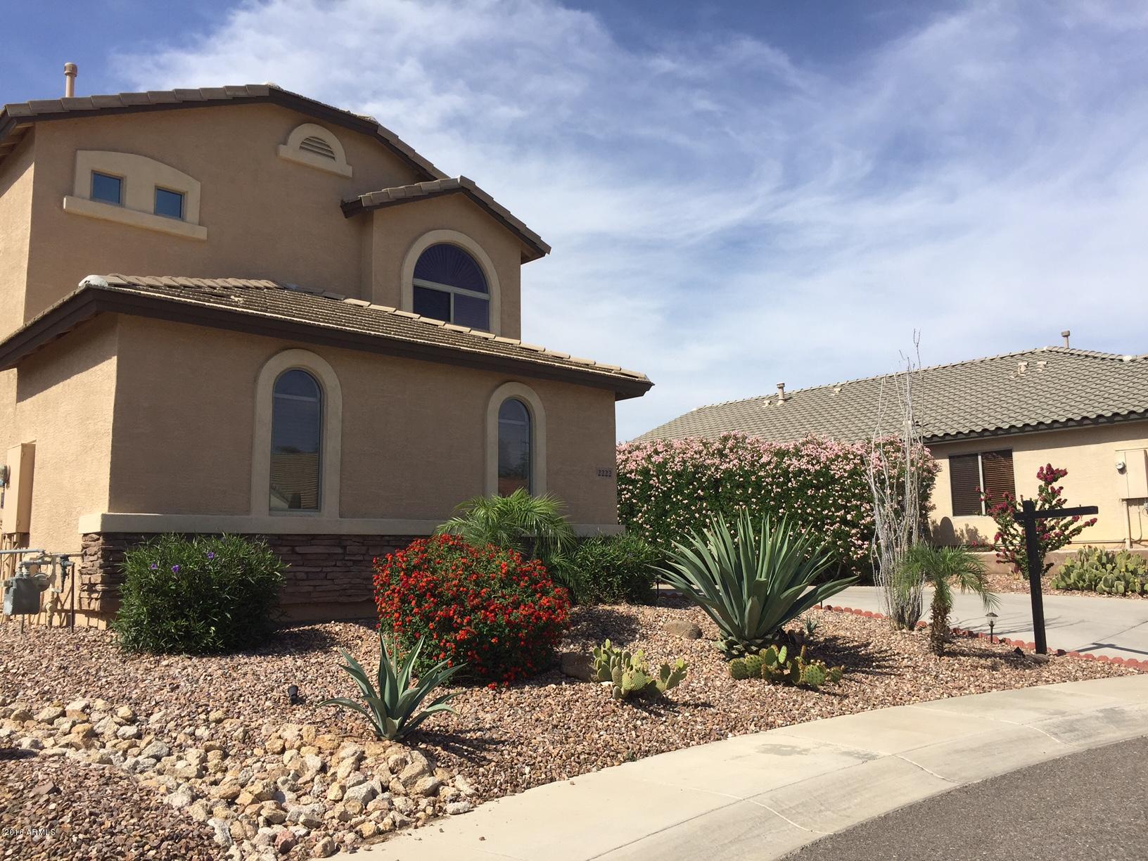 2222 West Roy Rogers Road Phoenix, AZ 85085 - Photo 32 of 37 front of home from the side