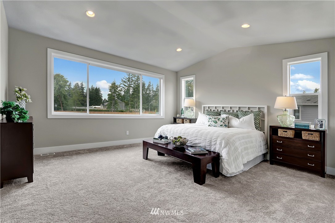 270 Graham Avenue Southeast Renton, WA 98059 - Photo 13 of 17 a spacious bedroom with a bed and window