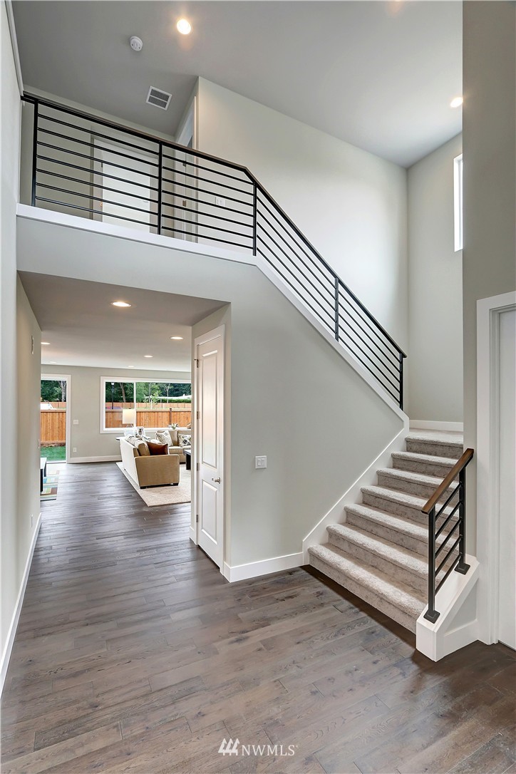 270 Graham Avenue Southeast Renton, WA 98059 - Photo 9 of 17 a view of a livingroom with furniture and stairs