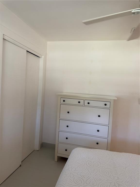 7390 South Mc Alpin Road McAlpin, FL 32062 - Photo 18 of 53 a room with a dresser and a night stand