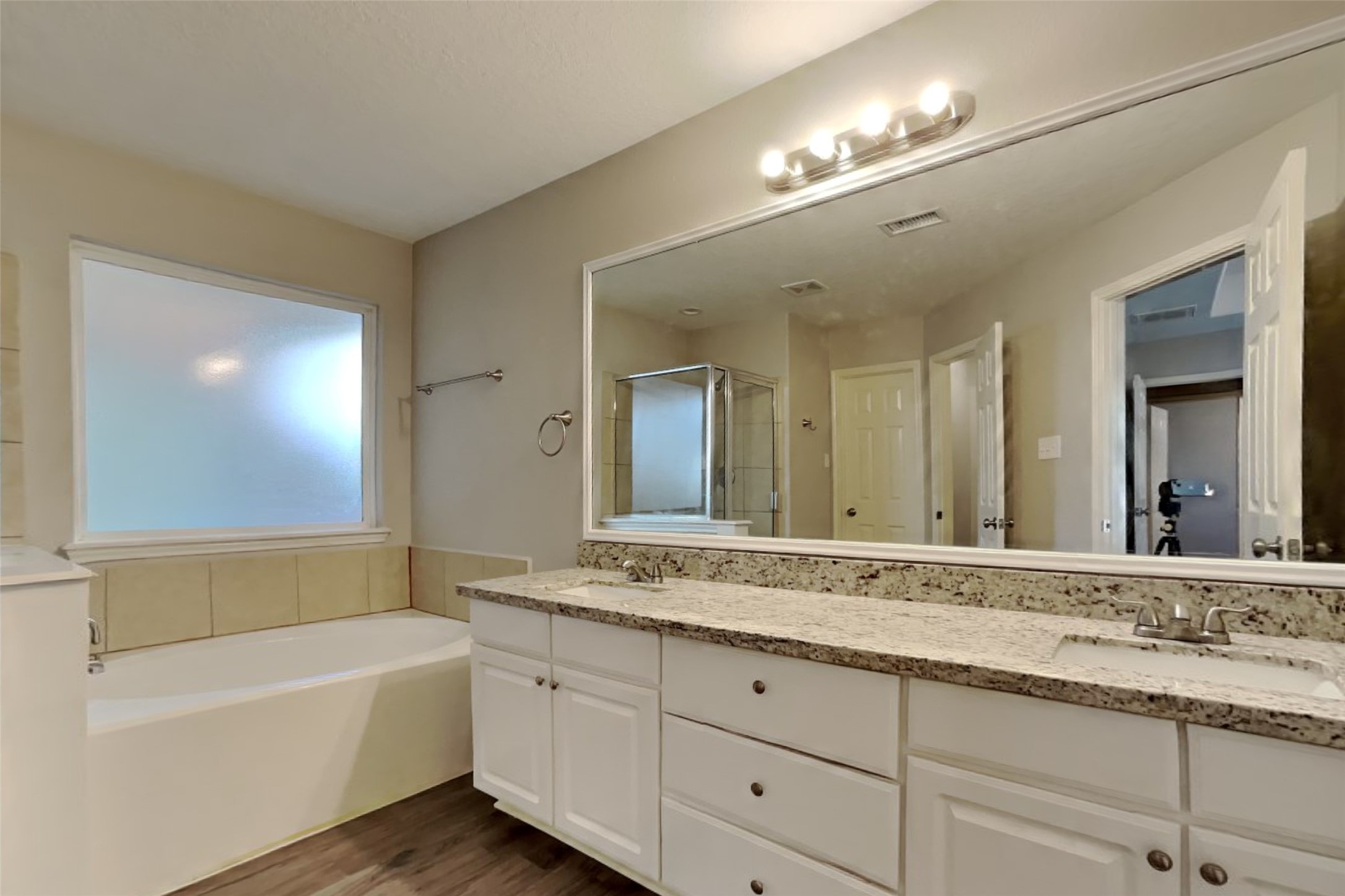 29323 Winton Wood Way Spring, TX 77386 - Photo 11 of 18 a bathroom with a granite countertop sink mirror and bathtub
