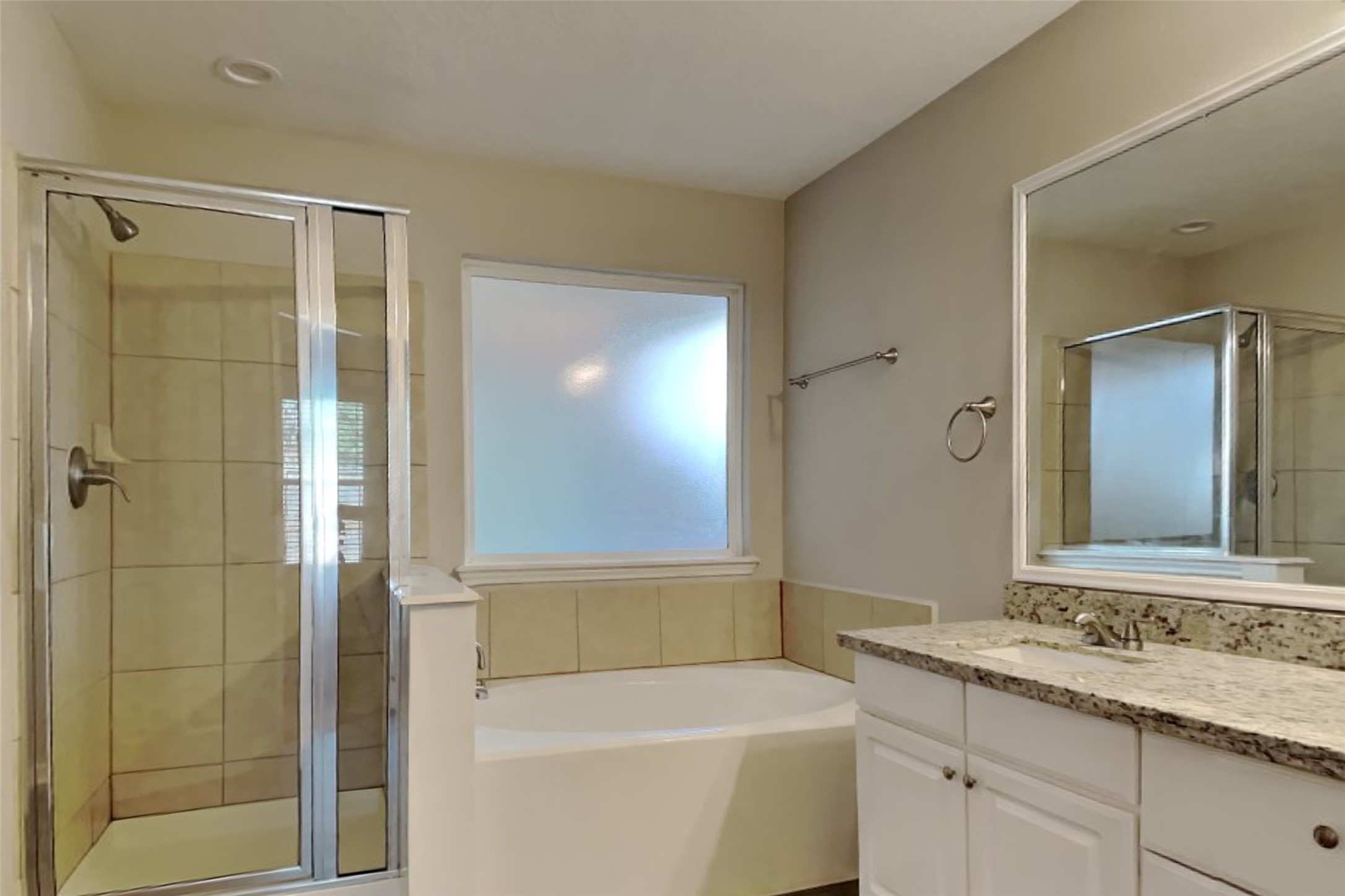 29323 Winton Wood Way Spring, TX 77386 - Photo 12 of 18 a bathroom with a granite countertop sink a toilet and shower